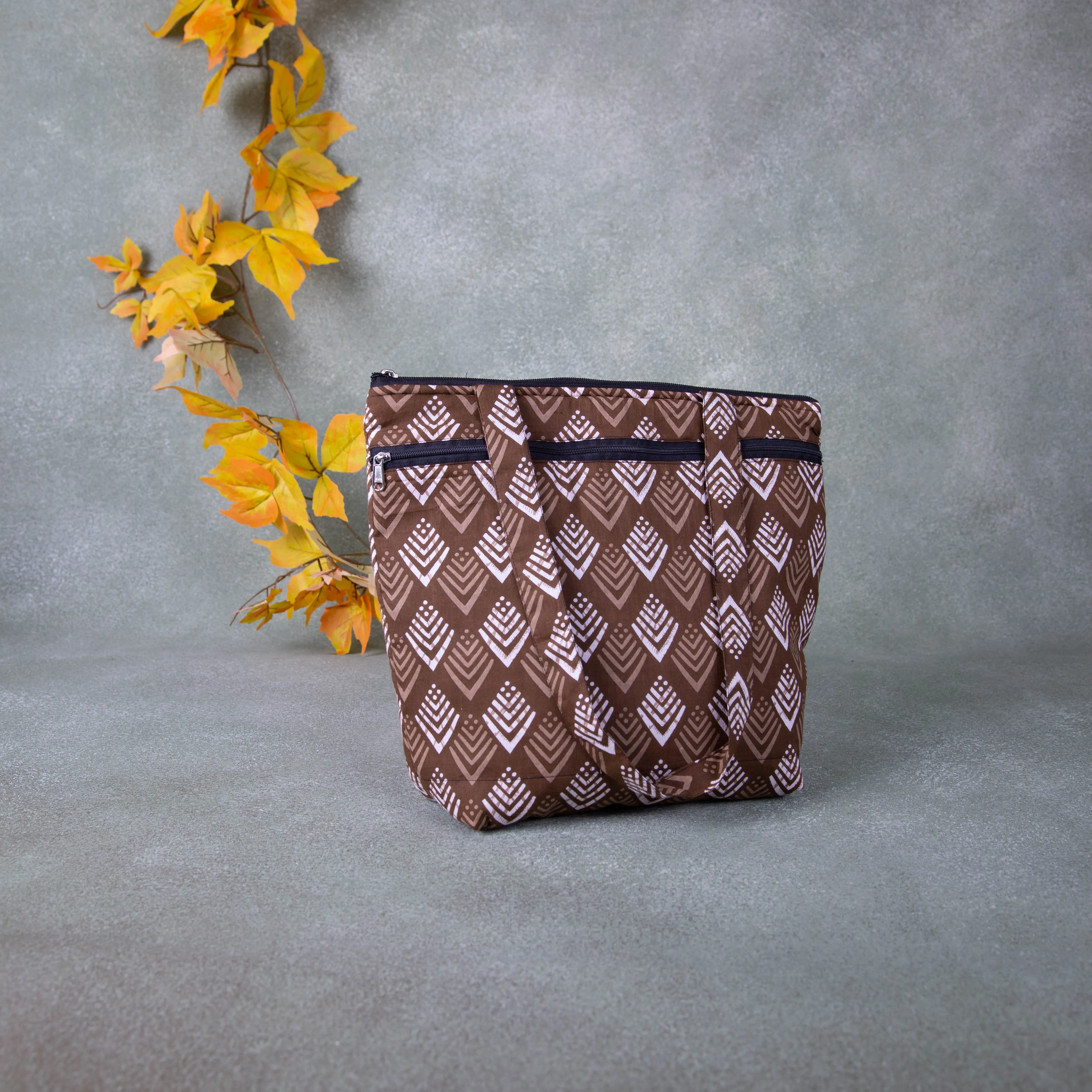 Medium Size Handbag Brown Colour with White Prints.