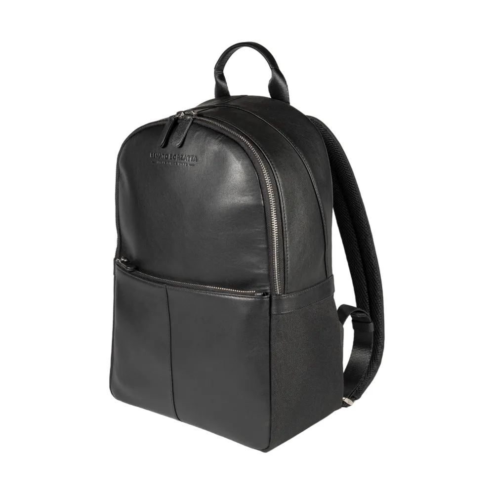 RB2001A | Nylon/Genuine Leather Netbook/Tablet Backpack, with light grain. Zip closure and adjustable shoulder straps - Black color - Dimensions: 27 x 38 x 14 cm. Packaging: Non-woven fabric bag