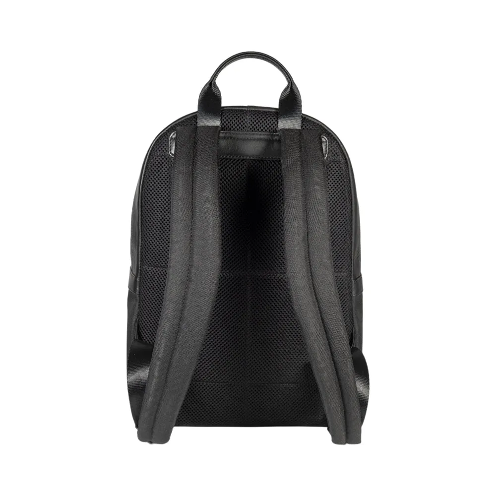 RB2001A | Nylon/Genuine Leather Netbook/Tablet Backpack, with light grain. Zip closure and adjustable shoulder straps - Black color - Dimensions: 27 x 38 x 14 cm. Packaging: Non-woven fabric bag